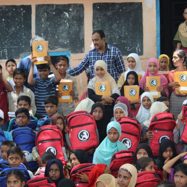 donating books and school supplies to children in need